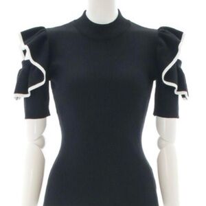 Black ruffle blouse. NWT 🖤